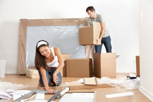 Office relocation planning in Walthamstow with moving boxes and workstations
