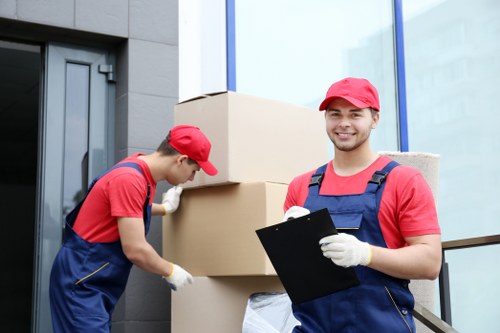 Removal van and boxes for a home move in Walthamstow