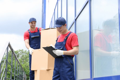A local moving team handling a flat move in Walthamstow with care