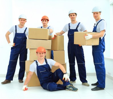 House moving team working on a residential street in Walthamstow