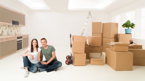 Moving van and boxes prepared for a local home relocation