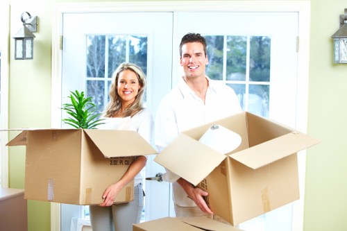 Packed office boxes and business equipment ready for transport